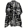 Black professional hair cutting and styling apron with various tools displayed on the fabric.