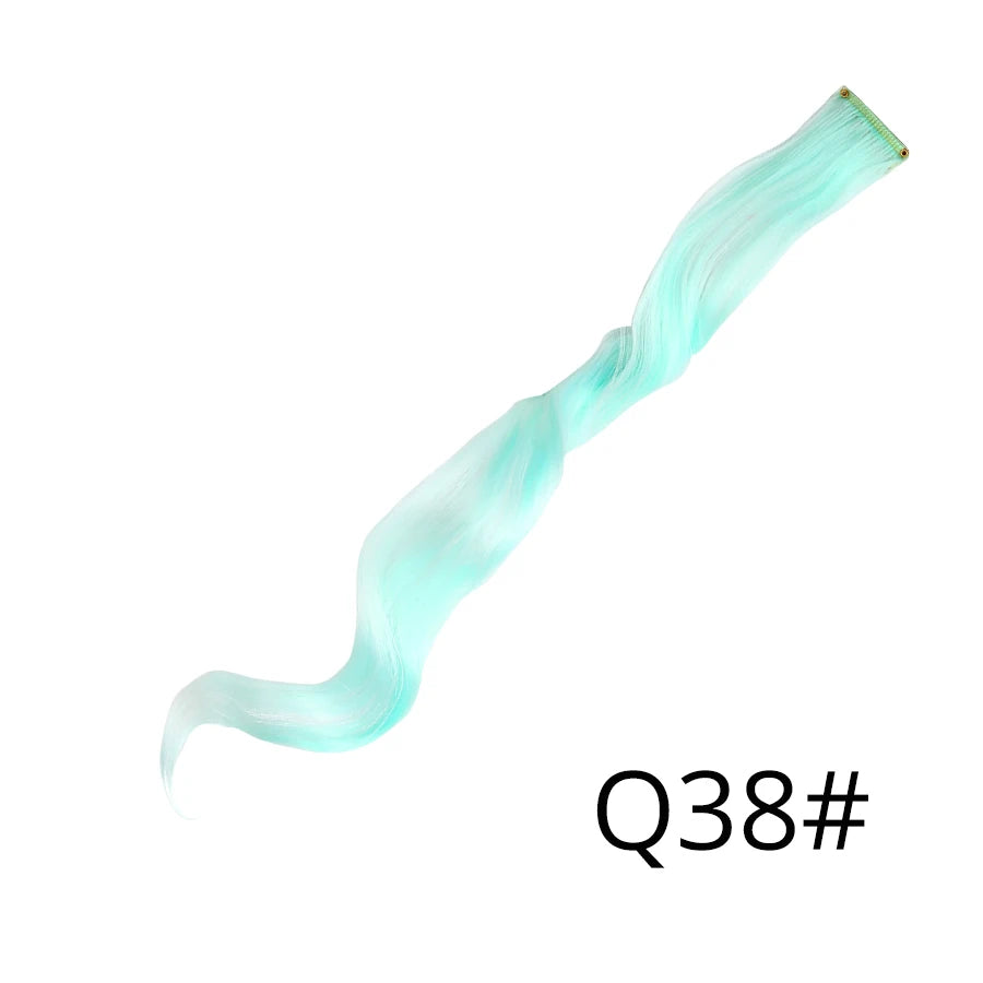 A swatch of light mint green synthetic hair extensions shown in a wavy, elongated style.