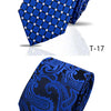 A pair of men's silk neckties, one blue patterned and one navy blue floral paisley.