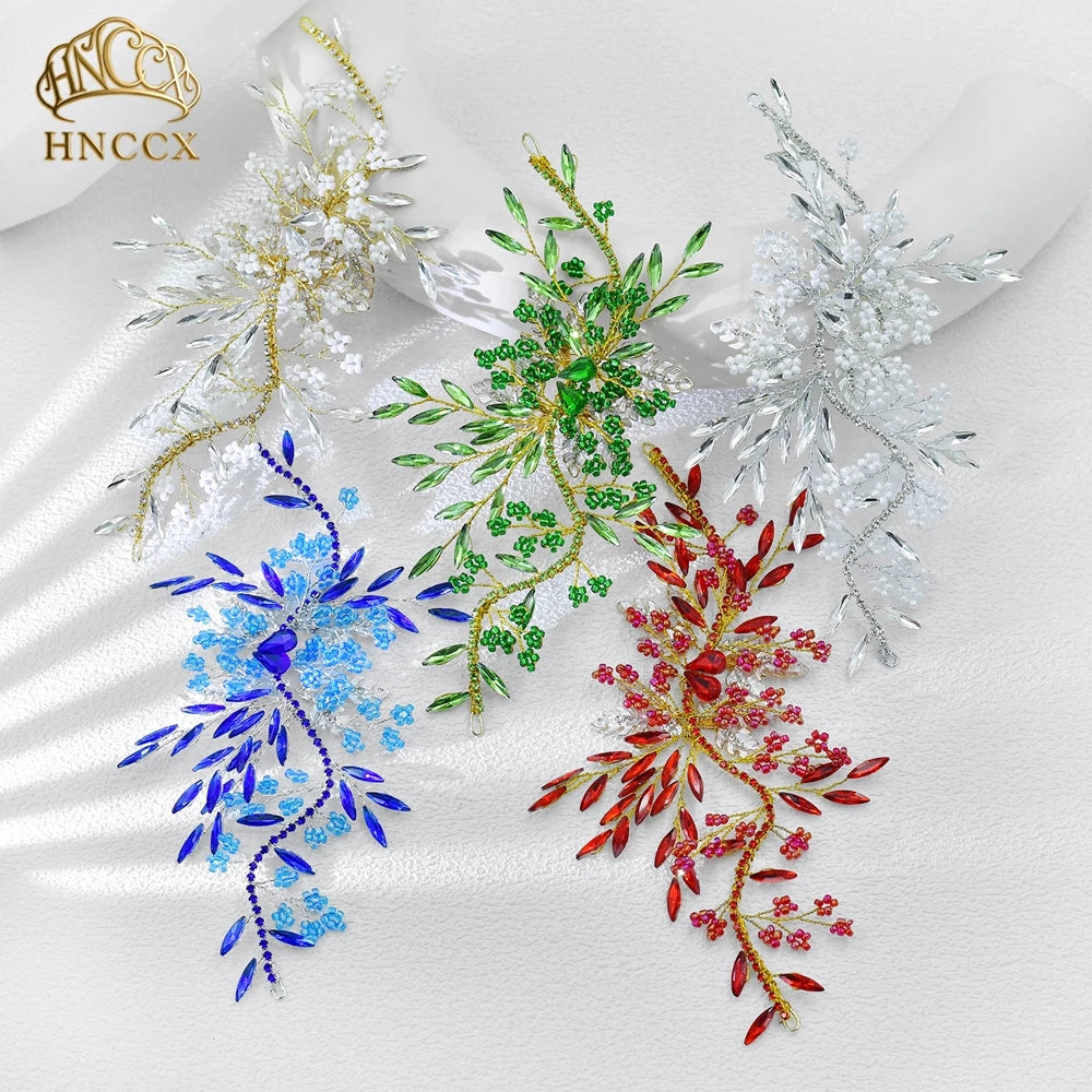 A collection of sparkling rhinestone bridal headbands and tiaras featuring white, green, blue, and red floral designs.