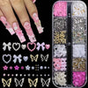 A collection of pink and white butterfly bow nail charms, including various shapes and glitter finishes.