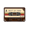 A vintage cassette tape enamel pin featuring the text BEST OF 1980 and a brown casing.