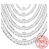 A close-up view of various sized geometric face chain necklaces made of 925 sterling silver.