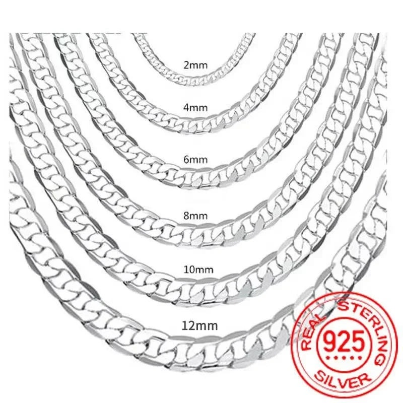 A close-up view of various sized geometric face chain necklaces made of 925 sterling silver.
