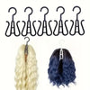 A set of black multi-use wig and accessory hangers with various curved hooks shown next to a blonde and a dark blue wig.