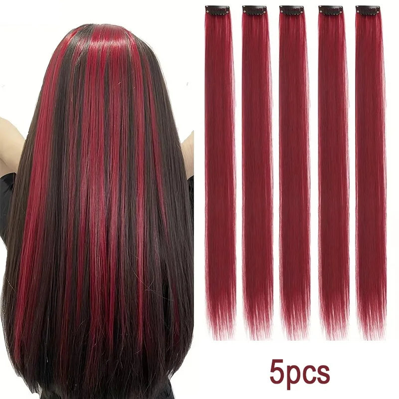 Un set de cinco extensiones de cabello rectas de 20 pulgadas en tonos negros y rojos.