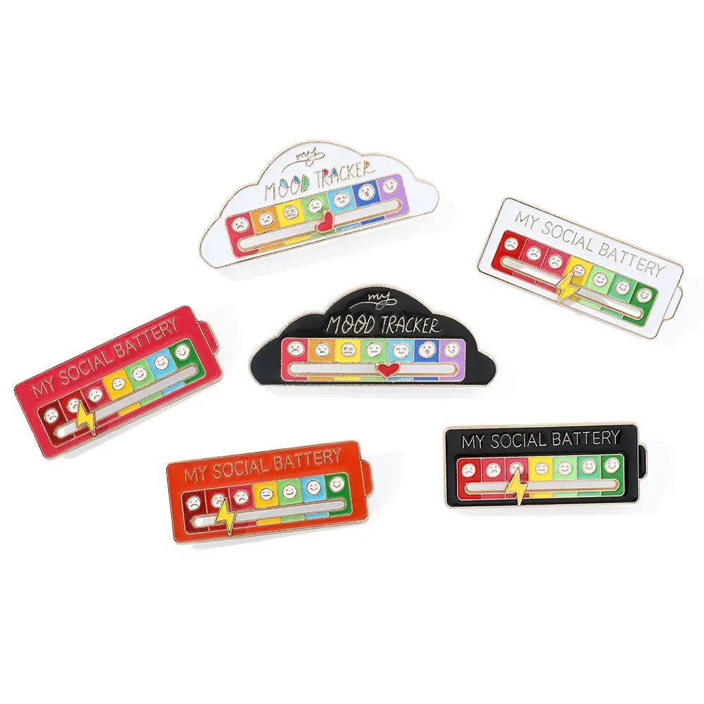 A set of mood tracker brooch pins and social battery battery pins for clothes.