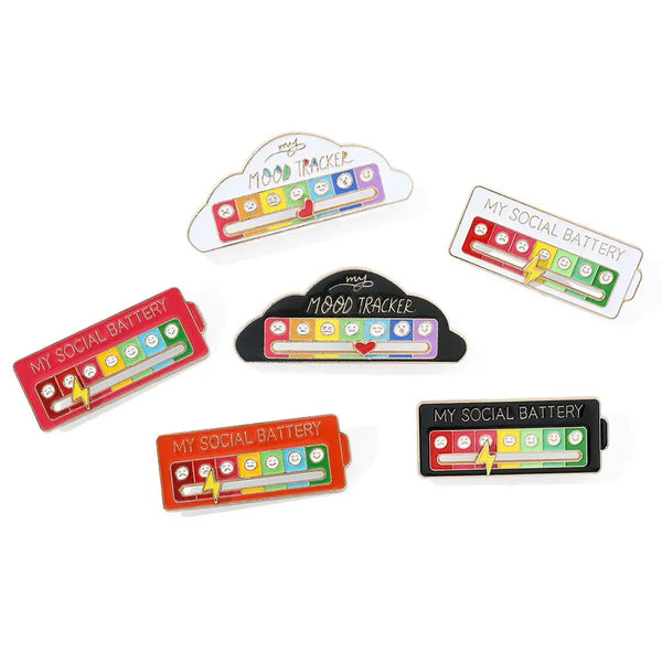 A set of mood tracker brooch pins and social battery battery pins for clothes.