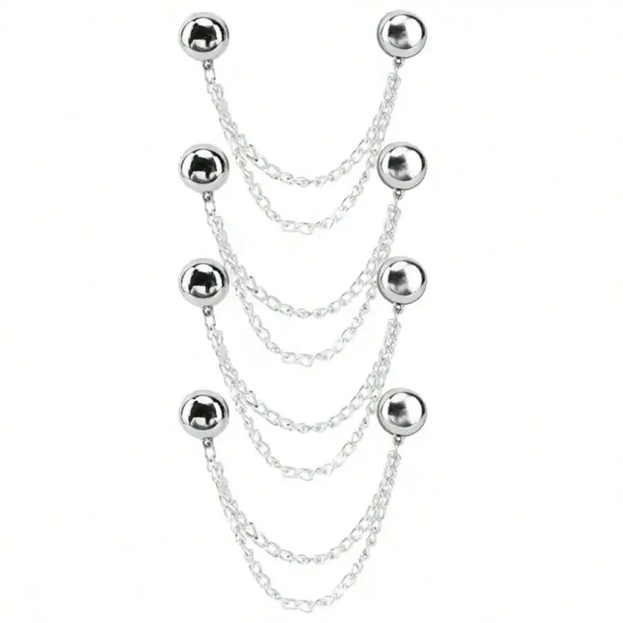 Silver multi-function magnetic clothing clips arranged in a hanging display.