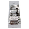 A set of vintage silver Y2K metal hair clips and accessories packaged in a light gray holder.