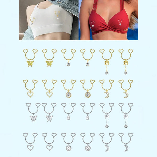 A collection of heart dangle non-piercing nipple rings with cubic zirconia in various styles and sizes.