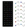 A set of stainless steel nose studs and body piercing jewelry for various piercings.
