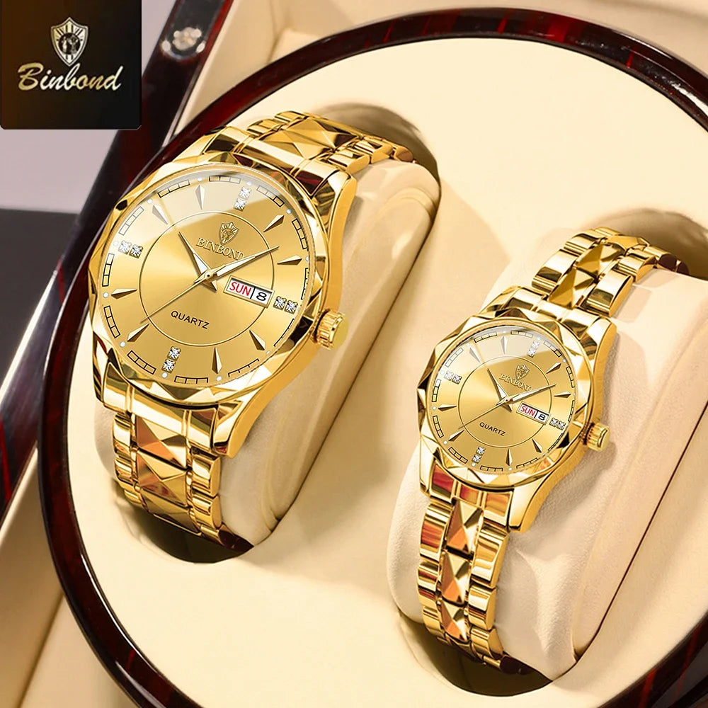 A pair of gold-toned quartz watches displayed on a light background.