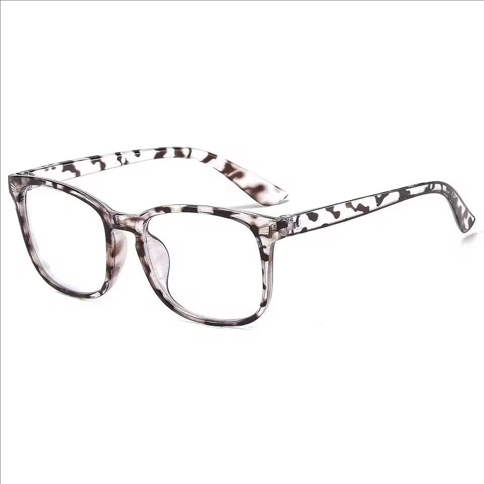 Une paire de lunettes transparentes bleues minimalistes avec motif léopard.