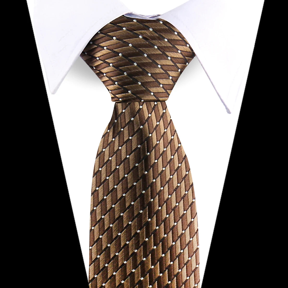 A close-up of an elegant brown floral paisley silk necktie against a white shirt.