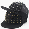 Black flat hat baseball cap covered in gold and silver rivets