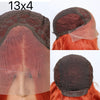 A close-up of a ginger orange loose wave wig with a lace front, showing the hair and wig cap.