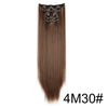 A bundle of long straight brown hair extensions with decorative clips.