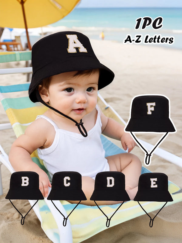 A set of 12 black A-Z letters printed on sun hats for kids