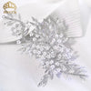 Silver rhinestone bridal headband featuring delicate floral and vine designs