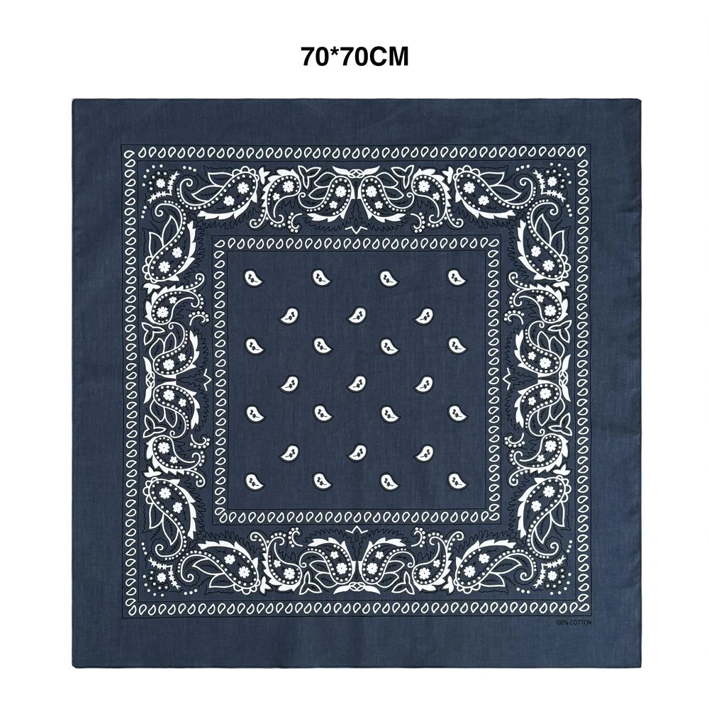Dark blue square fabric featuring white paisley embroidery and a central square design.