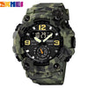 Montre sportive camouflage vert foncé numérique avec bracelet noir et affichage rond indiquant 10h29.