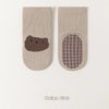 Pair of beige cat cartoon animal socks with a textured toe and a patterned heel