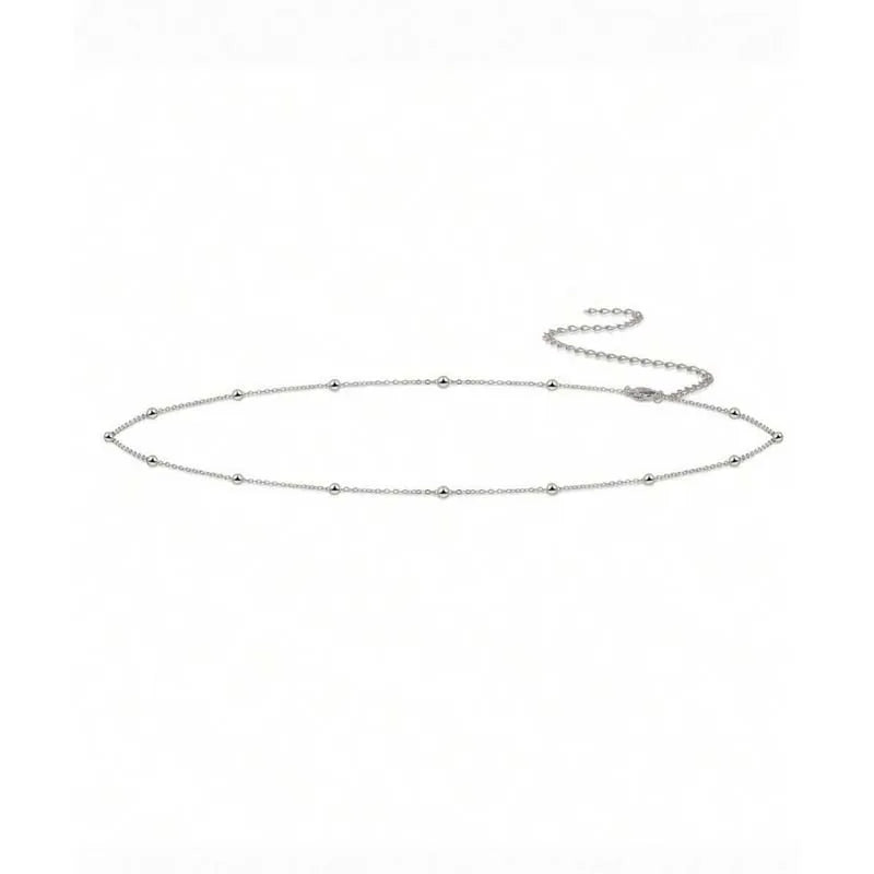 Gold layered metal belly chains for women displayed as a delicate necklace.