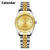 A luxury golden quartz wristwatch with a silver bracelet and watch band.