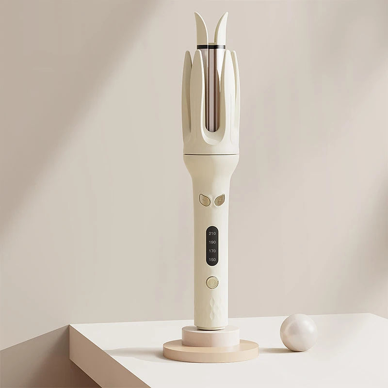 A white professional automatic curling iron with a vertical design resting on a wooden base.