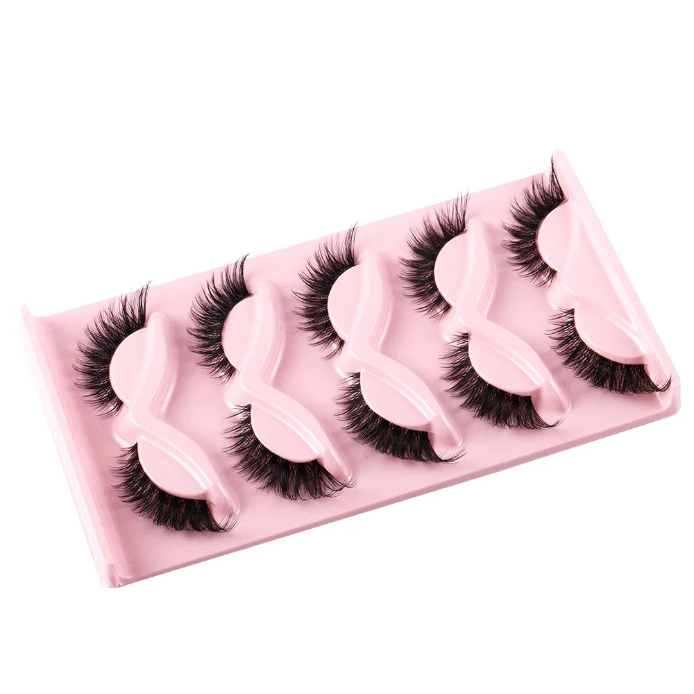 A pink strip of premium false cat eye eyelashes displayed on a white background.