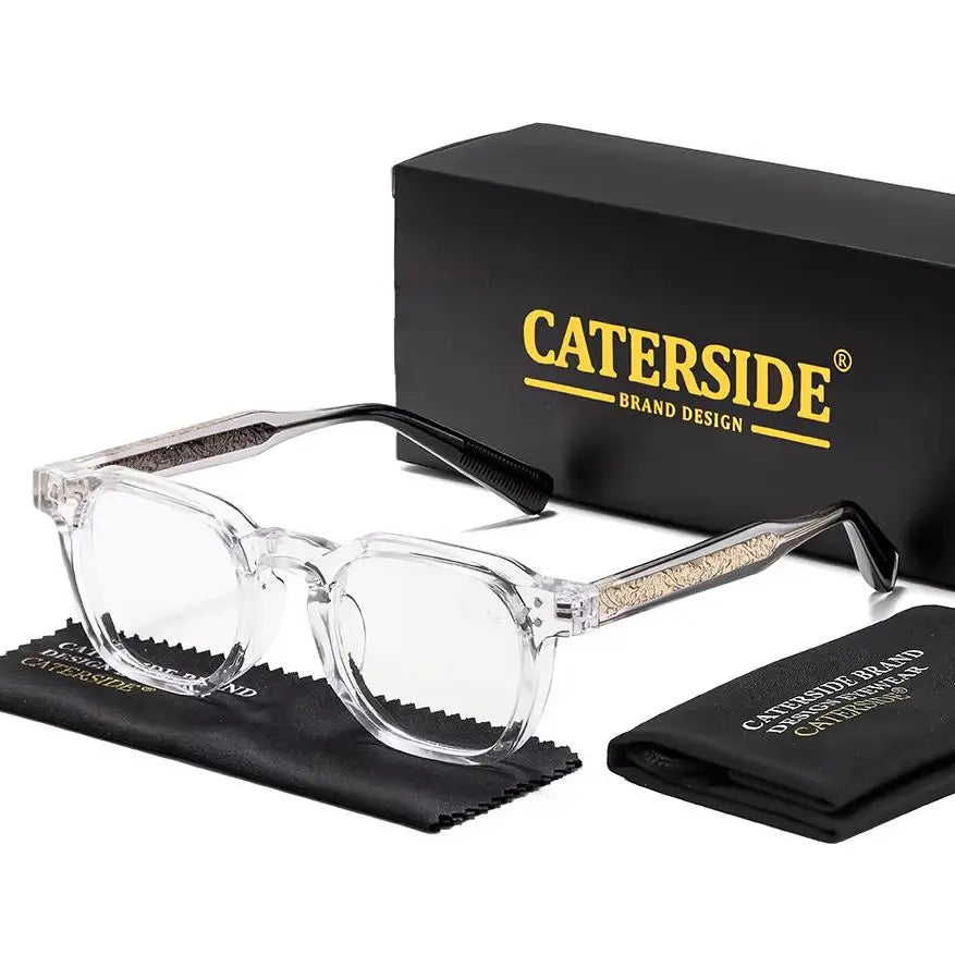 A pair of clear retro square anti-blue light eyeglasses resting on a black case and packaging box.