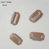 A set of brown T-shaped precision hair extension clips.