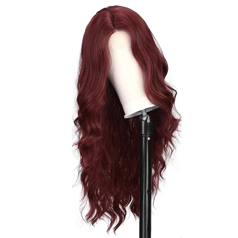 A long, wavy synthetic wig in a deep red wine color displayed on a mannequin head.