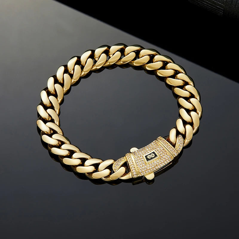 A gold Cuban link chain necklace in stainless steel displayed against a dark background.