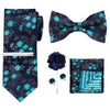A navy blue men's formal tie and accessory set featuring a patterned tie, bow tie, and pocket square.