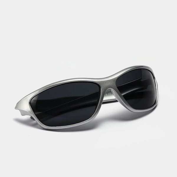 Silver-framed sunglasses with black lenses shown against a white background.