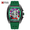 A luxury wine barrel quartz watch with a dark green strap and an intricate, colorful mechanical movement visible through the 