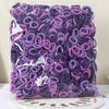 A pile of purple nylon elastic hair cords for kids headbands packaged in clear plastic.