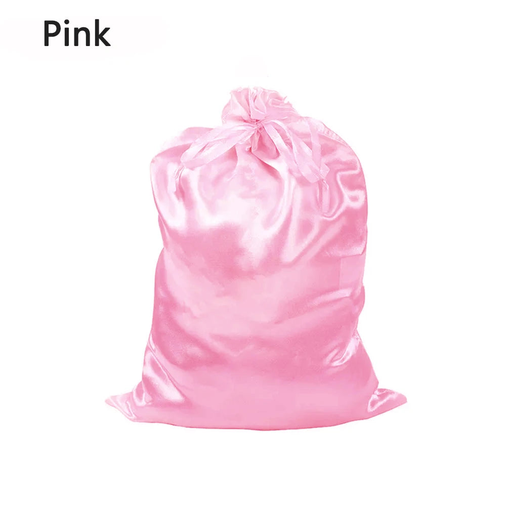 A pink satin drawstring storage bag is shown.