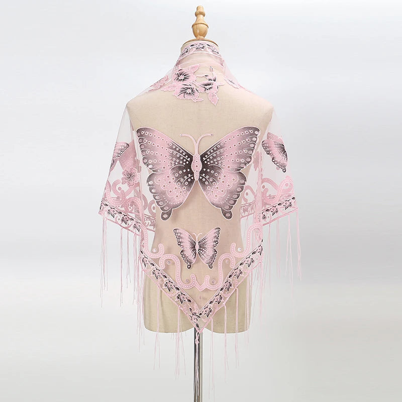 A pale pink butterfly lace scarf shawl displayed on a mannequin.