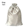 Gray satin drawstring storage bag for hair tools