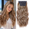 Long wavy blonde hair with ombre highlights styled in loose curls and secured with dark fabric clips