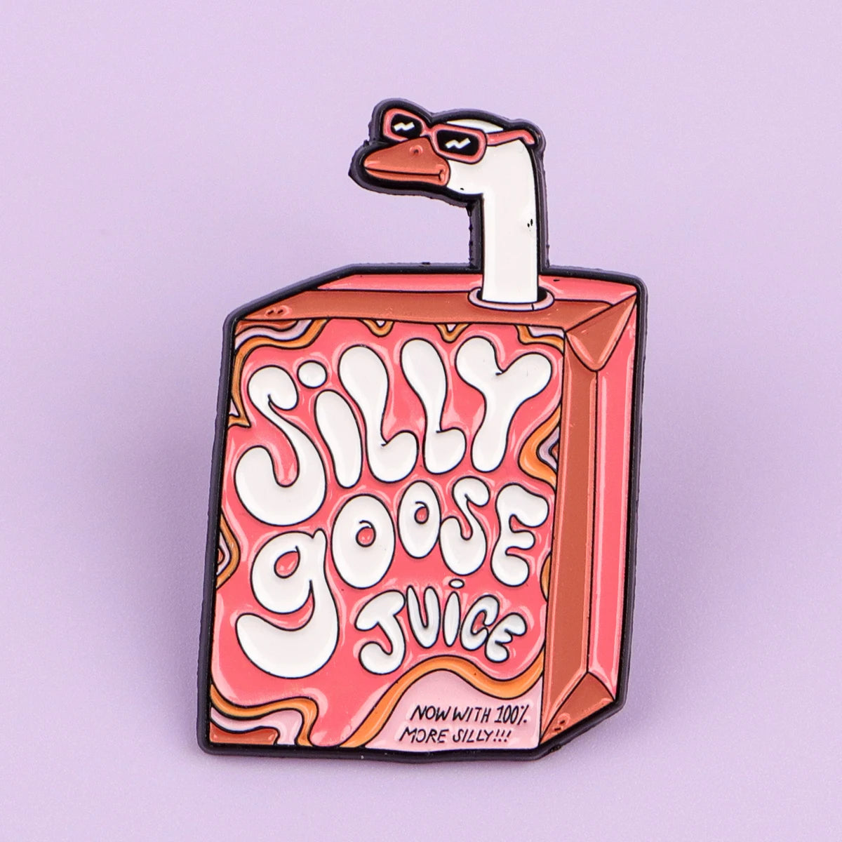 An enamel pin featuring a cartoon goose with sunglasses and the text Silly Goose Juice