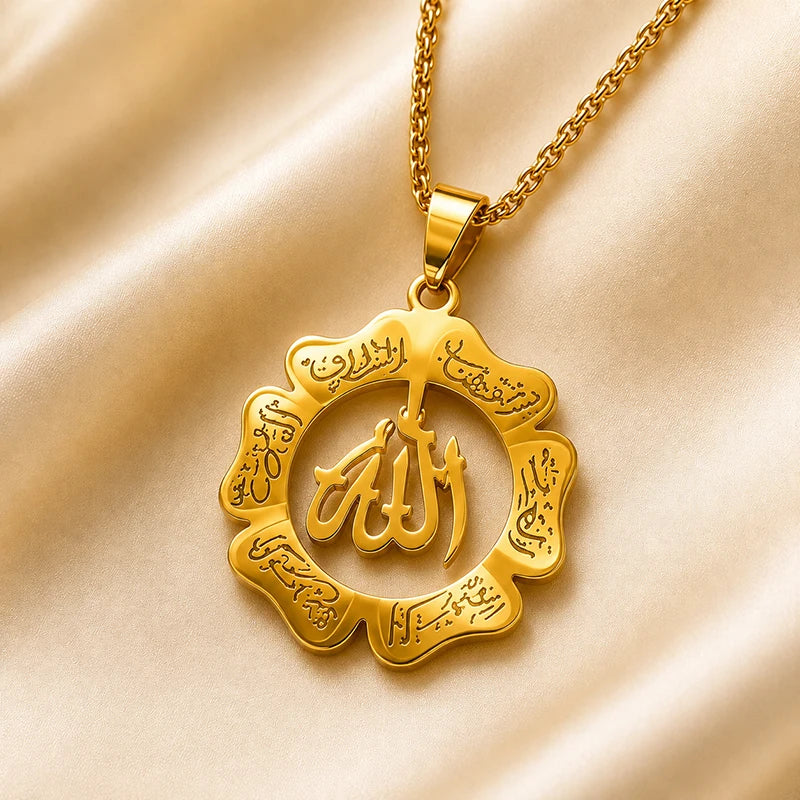 A gold Islamic Ayatul Kursi pendant necklace with Arabic calligraphy on a delicate chain.