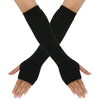 Black knitted fingerless gloves crossed on a hand