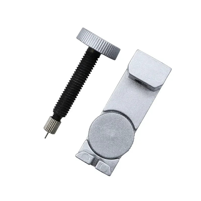 A set of three precision watch link pin remover tools, featuring a threaded tool and a flat pin removal device.