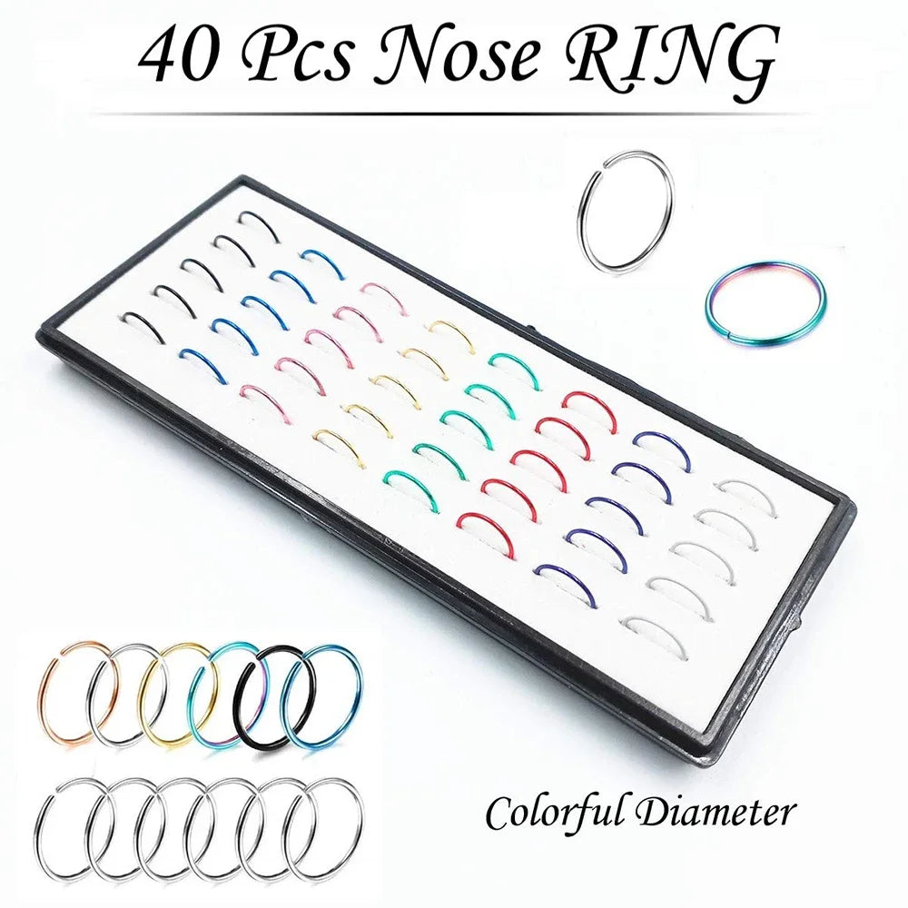 A display of 40 colorful stainless steel nose rings and stud piercings.
