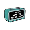 A teal enamel lapel pin shaped like a rectangular box with the text I DON'T WANT TO ADULT TODAY engraved on it.