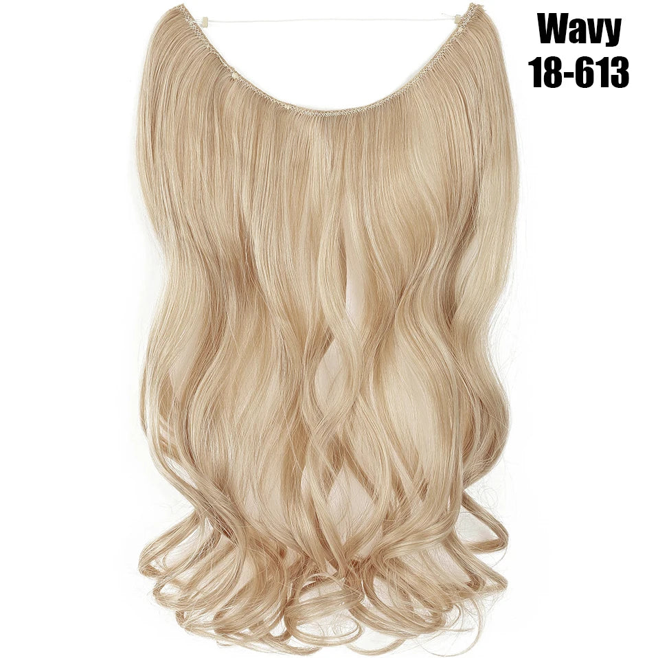 Blonde wavy hair extensions in a natural shade, shown hanging on a hanger.